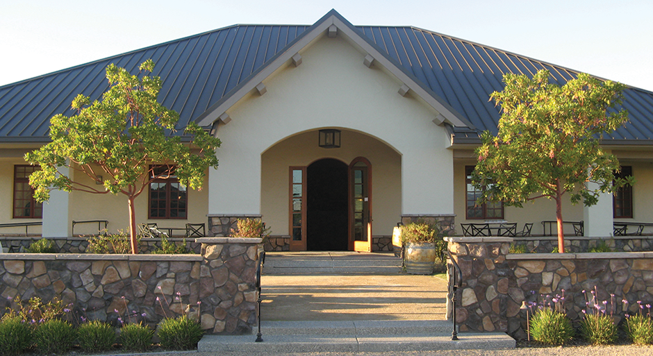 Entrance to the Foley Estates tasting room, featuring elegant architecture and welcoming surroundings.